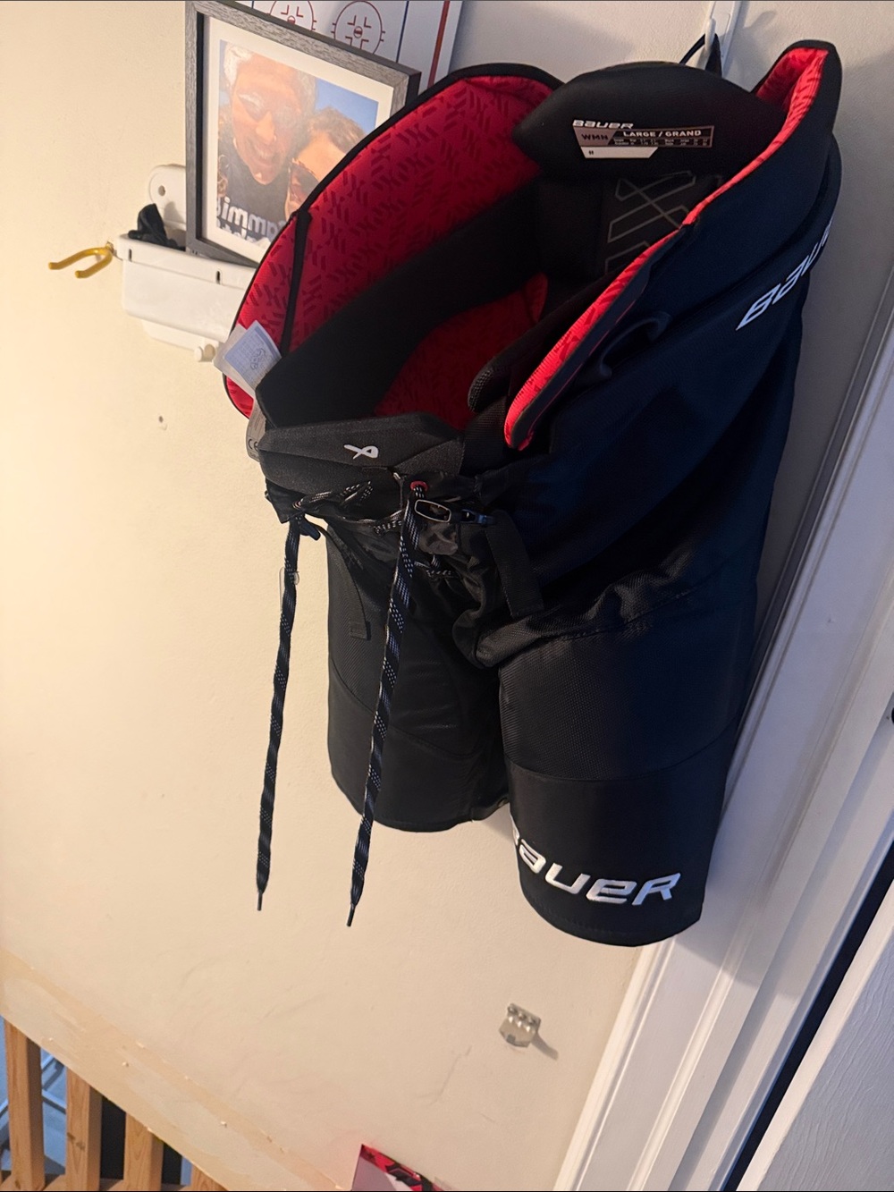 Bauer Black Hockey Pants with Red Inner Liner